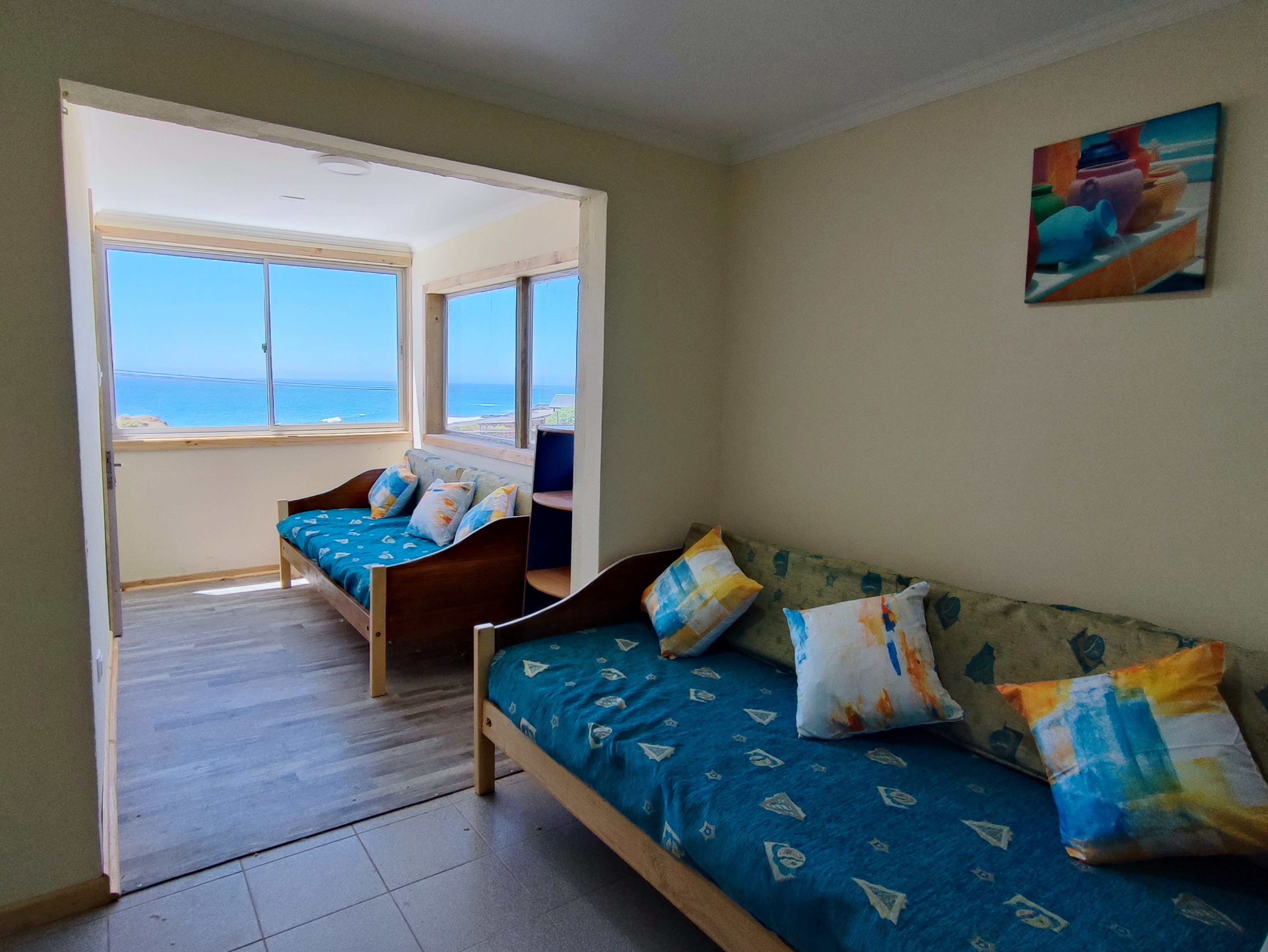Sala de estar con sofás cama Cabaña Familiar 3 Pelluhue